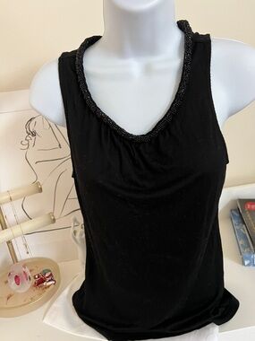 Black Sleeveless Beaded Neckline Tank
Fits like XS-S